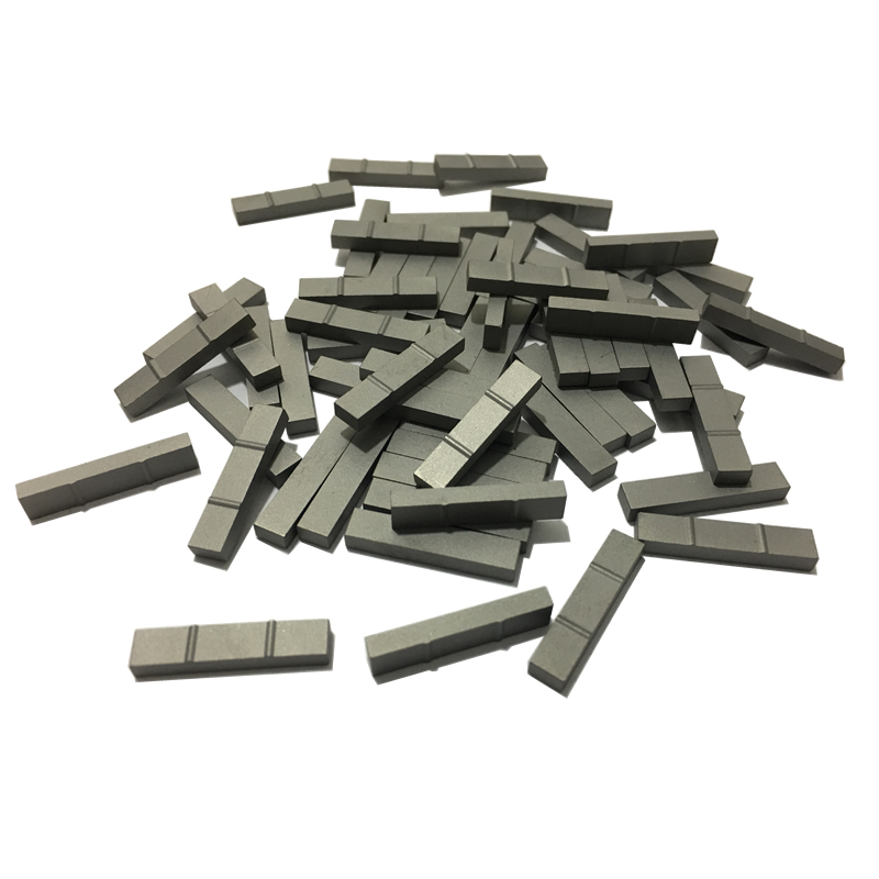 Tungsten carbide inserts/wear tiles for stabilizers