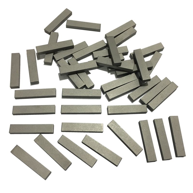 Tungsten carbide inserts/wear tiles for stabilizers