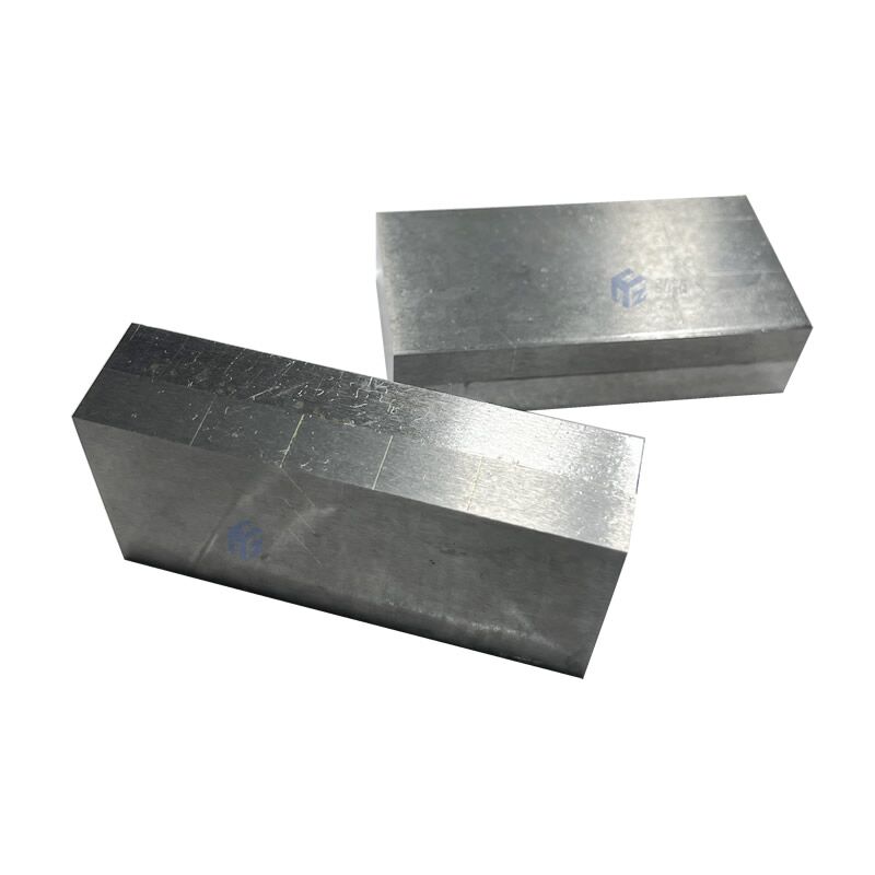 Cemented carbide tips brazed wear resistant plate.