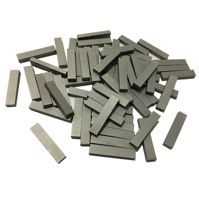 Tungsten carbide inserts/wear tiles for stabilizers