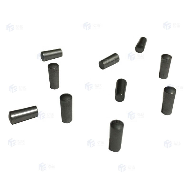 Tungsten carbide pins for tire stud core