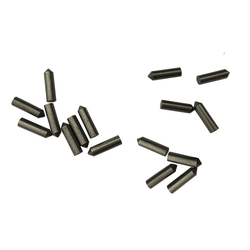 Tungsten carbide pins for tire stud core